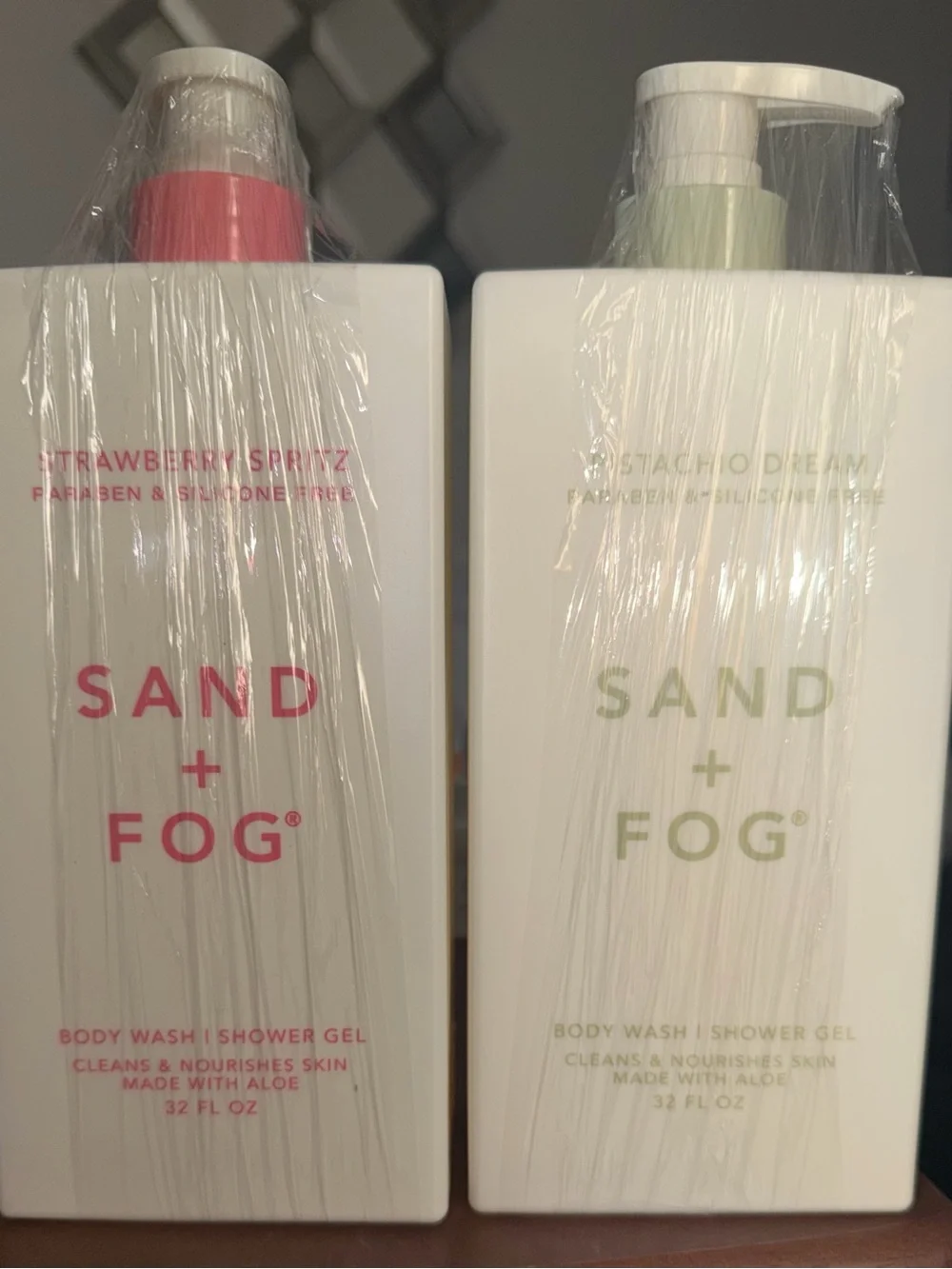 SAND + FOG Strawberry Spritz and Pistachio Dream body wash. 32 ounces each.